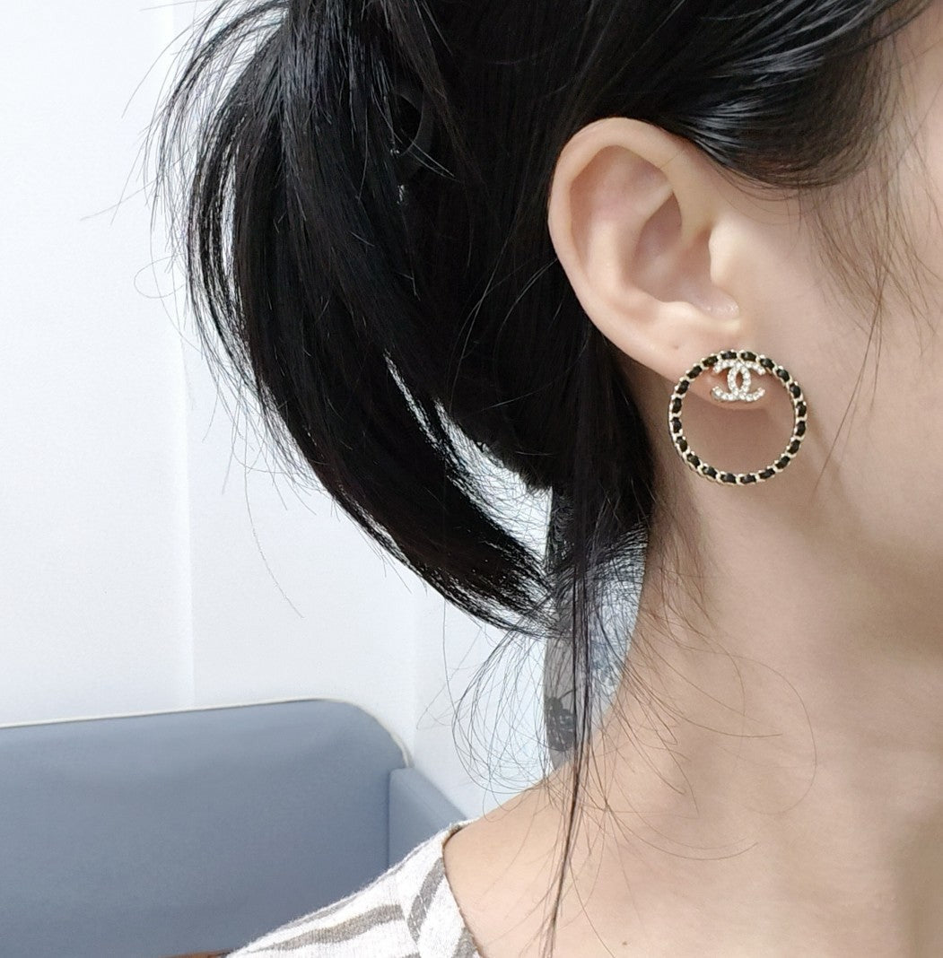 18K Chanel Black Leather Circle Earrings